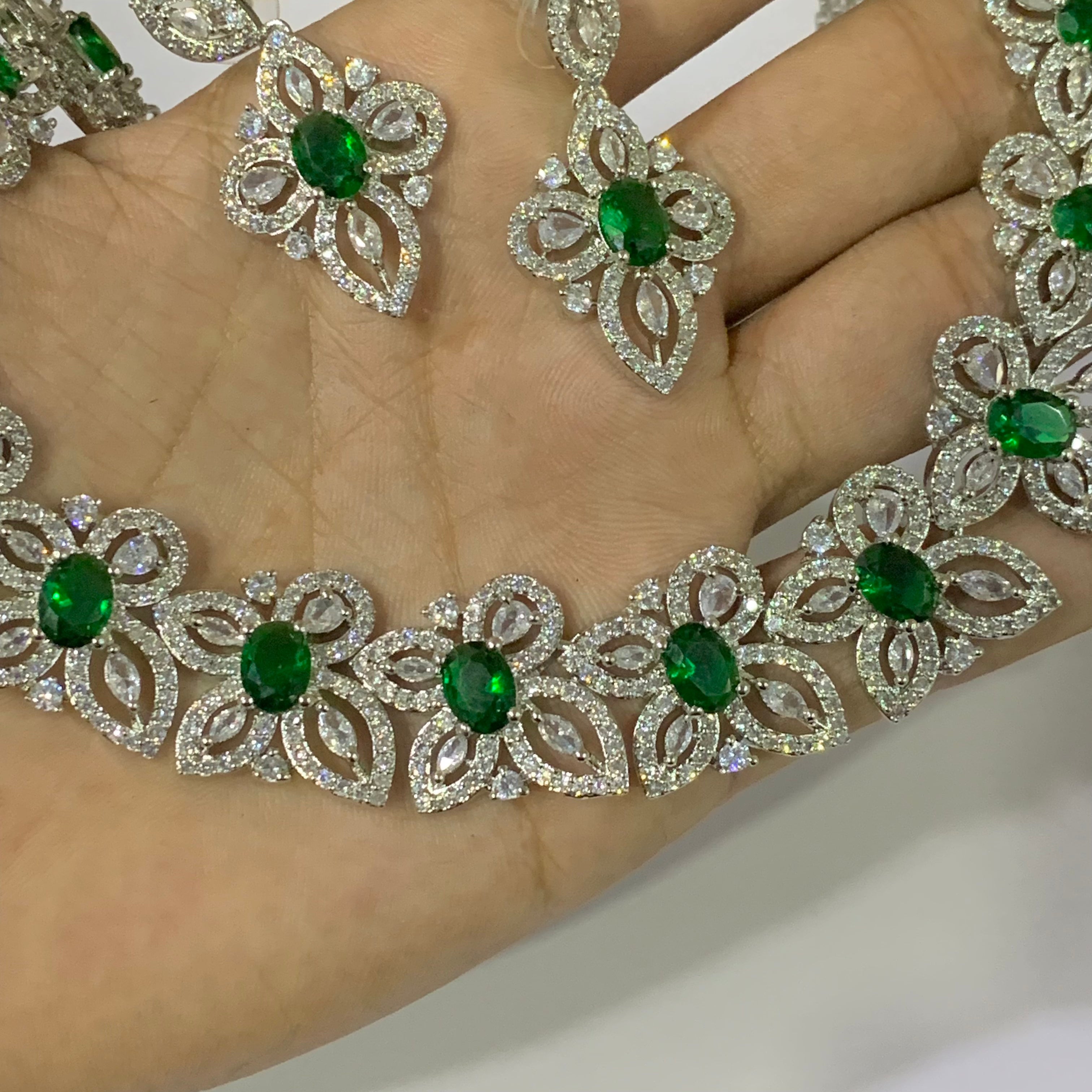 White Finish Faux Diamond and Emerald Necklace Set Design by Nepra By Neha  Goel at Pernia's Pop Up Shop 2024